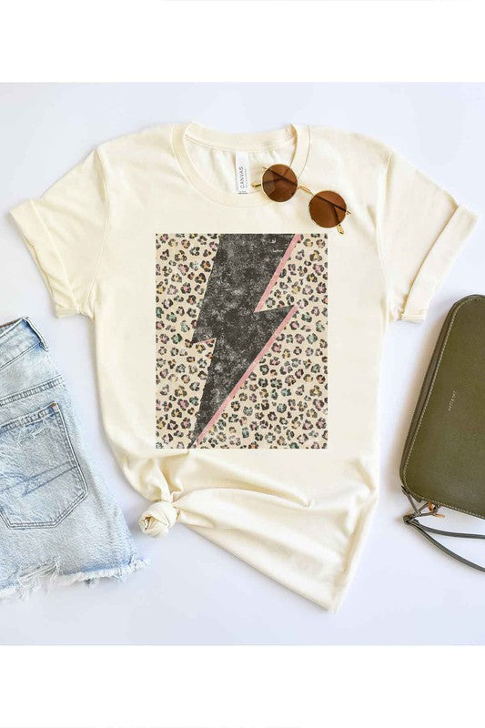 Model wearing Bellem Trading’s ivory Leopard Lightning plus size graphic tee, premium cotton, bold leopard graphic.