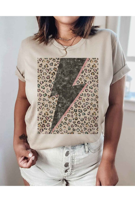 Model wearing Bellem Trading’s ivory Leopard Lightning plus size graphic tee, premium cotton, bold leopard graphic.