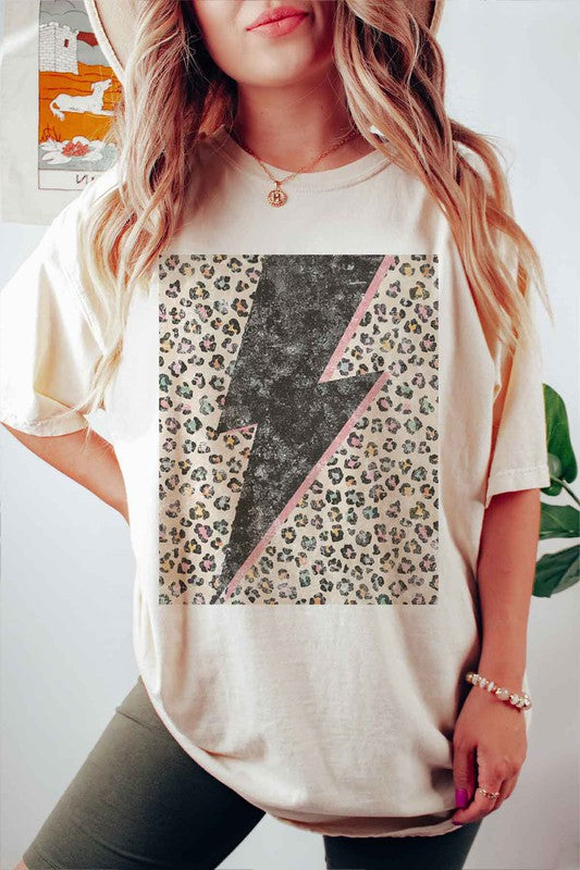 Model wearing Bellem Trading’s ivory Leopard Lightning plus size graphic tee, premium cotton, bold leopard graphic.