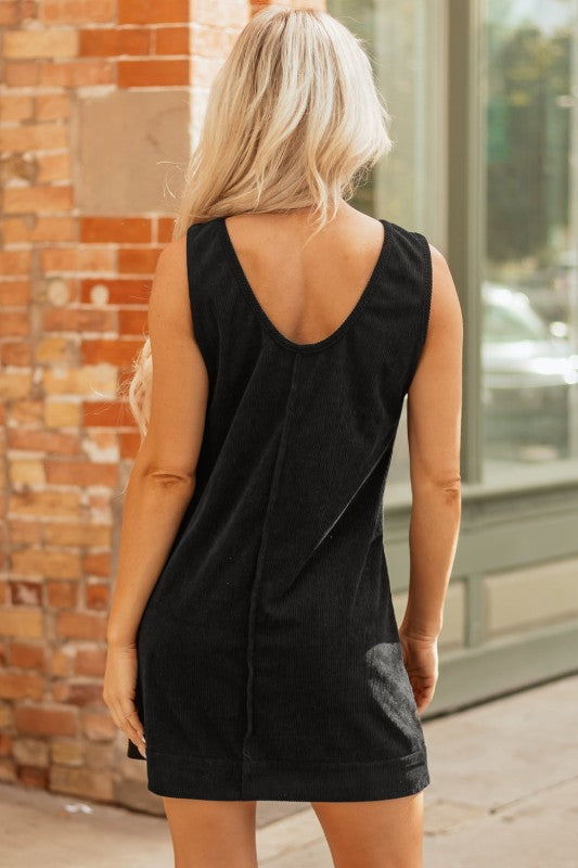 Black corduroy sleeveless mini dress with vintage patch pockets, Bellem Trading women’s fall fashion