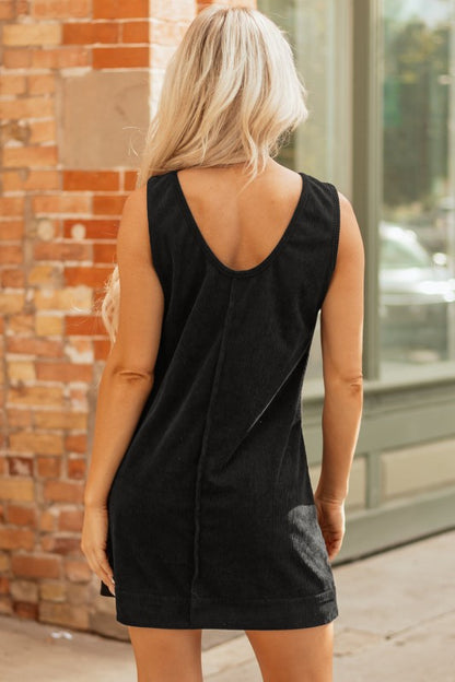 Black corduroy sleeveless mini dress with vintage patch pockets, Bellem Trading women’s fall fashion